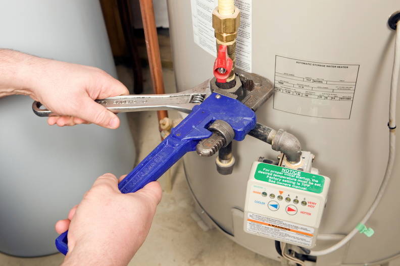Water_Heaters_Plumber_Pipe_and_Adjustable_Wrenches_on_Water_Heater_Gas_Line_Stock_image-me Water_Heaters_Plumber_Pipe_and_Adjustable_Wrenches_on_Water_Heater_Gas_Line_Stock_image-me
